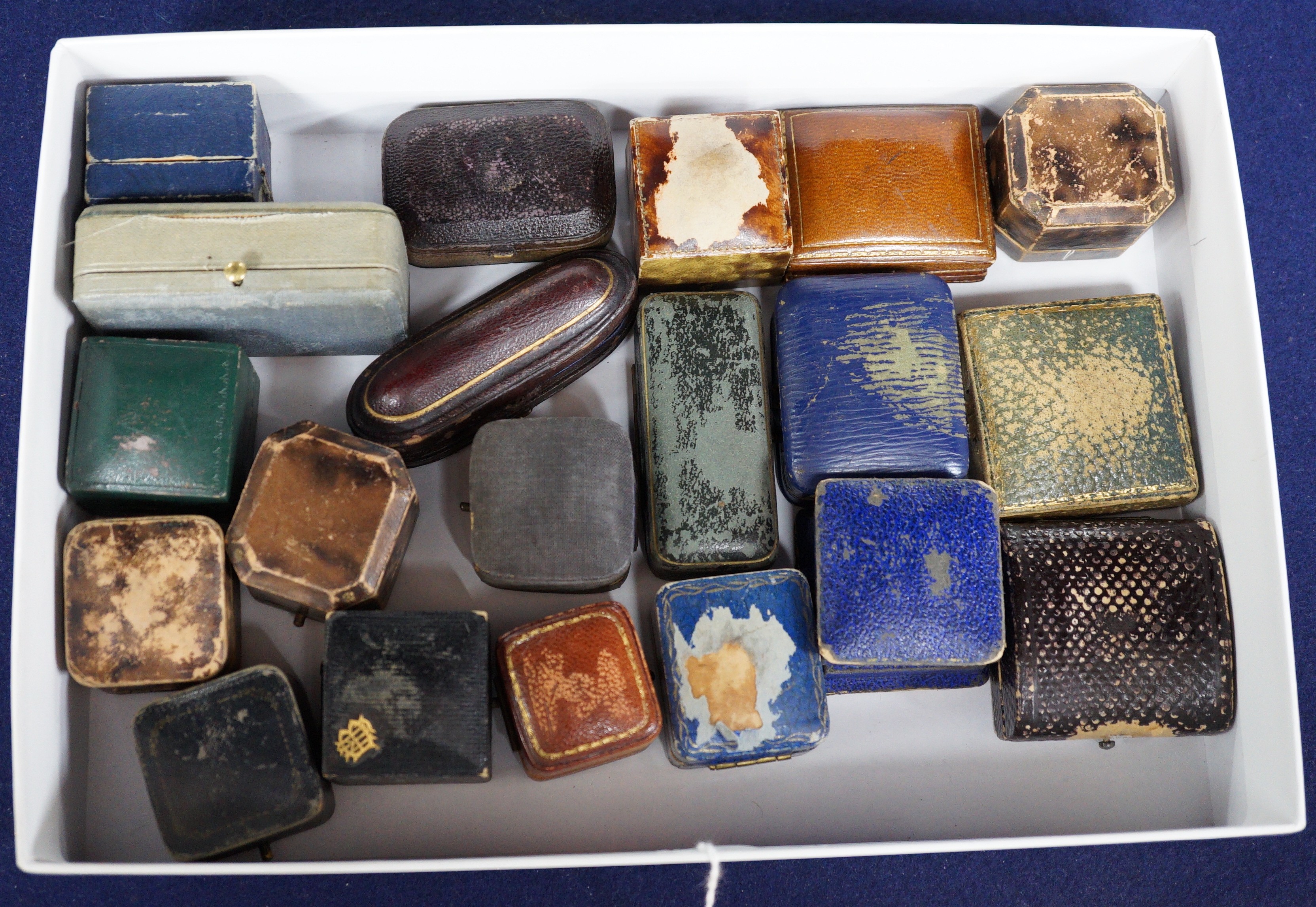 A small group of assorted jewellery boxes including gilt tooled leather.